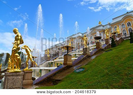 Peterhof, Russia - June 03. 2017. Gold sculptures of the Great Cascade Fountain