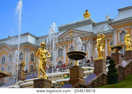 Peterhof, Russia - June 03. 2017. Gold sculptures of the Great Cascade Fountain