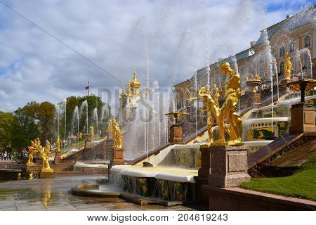 Peterhof, Russia - June 03. 2017. Gold sculptures of the Great Cascade Fountain