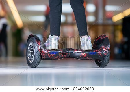 Girl Feet On The Hover Board. Self-balancing Scooter Or Mini Segway.