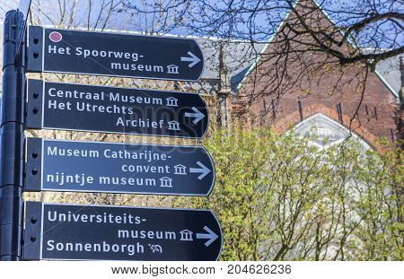 UTRECHT, NETHERLANDS - APRIL 09, 2017: Tourist sign in front of the Dom church in Utrecht Netherlands