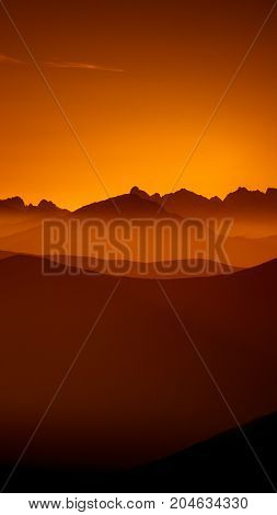 An Inspiring Mountain Landscape In Tatry, Slovakia. Vivid, Gradient Scenery With Perspective In Red