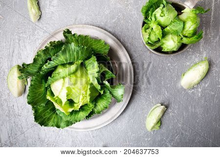 Fresh Green Cabbage In Metal Plate On Grey Background. Top View. Copy Space.