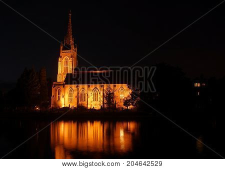 Marlow Church reflected in the River Thames at night