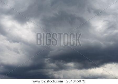 Dark clouds - big storm. Rainy clouds and rainy day