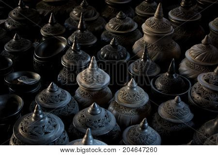 group of thai style sculpture clay pot