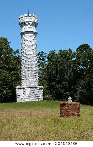 a roll of hay in front of Wilder Tower in the Chickamauga Battlefield