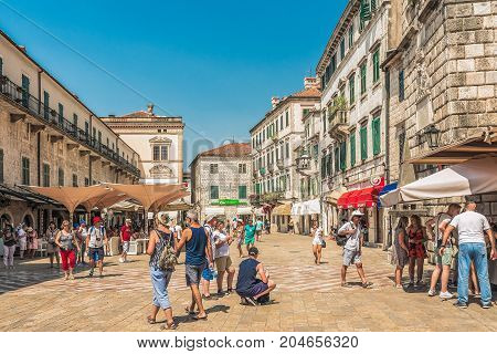 KOTOR, MONTENEGRO - AUGUST 24, 2017: View of the Arms Square in the Old Town of Kotor. Kotor is a city on the coast of Montenegro and is located in Kotor Bay.