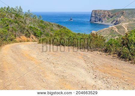 Beach, Cliffs, Trail And Mountain In Canal Beach