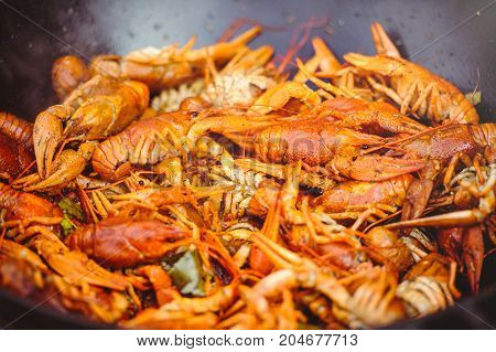 Red Large Boiled Crayfish In Hot And Apetized Cauldron Is Steam