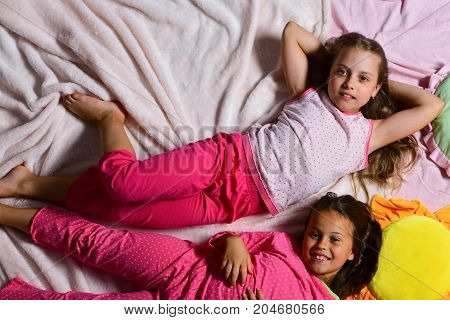 Kids With Smiling Faces Have Rest In Bed