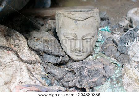 Clay idol of Goddess Durga under preparation for "Durga Puja' festival in Kumartuli Kolkata. Biggest festival of Hinduism.