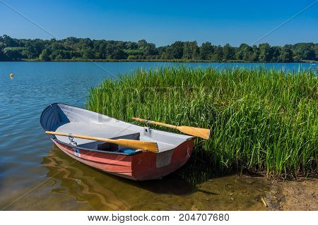 Life guard boat at the coast of the Rusalka lake on a sunny day on August 2017 in Poznan Poland