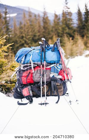 Backpack Is Standing On The Snow.