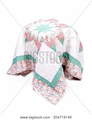 Vintage patchwork cotton blanket isolated on white background