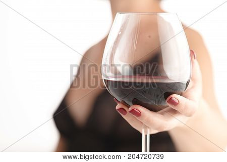 Female With Red Maniсure Nail Hold Glass With Alcohol