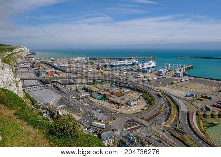 Dover Kent England Uk - August 17.2017: Ariel view of the Dover Ferry Port and harbour taken from the viewing point at the Castle. Daytime shot made with a wide angle lens.