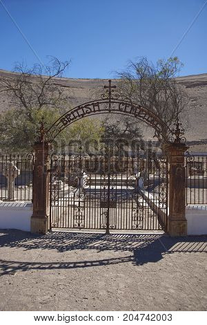 Tiliviche, Tarapaca Region, Chile - August 21, 2017: Historic British Cemetery from the era of nitrate mining in the Atacama Desert, in the grounds of Hacienda Tiliviche in northern Chile.