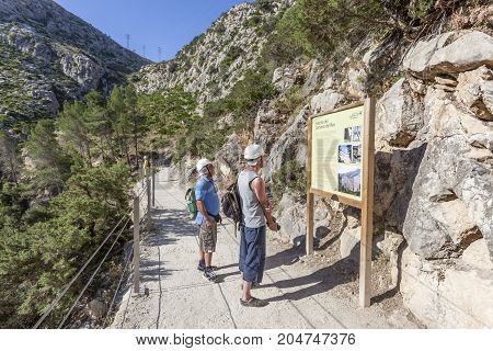 El Chorro Spain - May 31 2017: People at the hiking trail 'El Caminito del Rey' - King's Little Path former world's most dangerous footpath wich was reopened in May 2015. Ardales Malaga province Spain