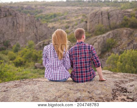 A young couple came to the mountains for a vacation. Healthy lifestyle.