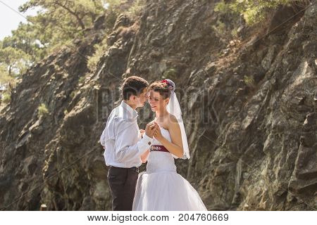 Romantic dating. Young loving couple embracing on nature.