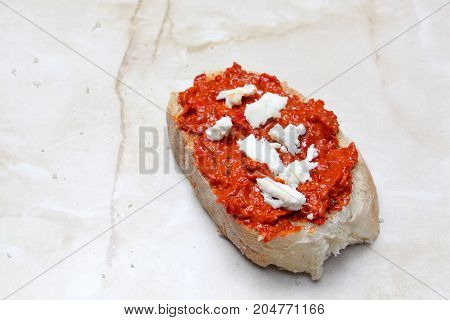 Pieces Of A Cheese On Traditional Macedonian Food Ayvar Smeared On A Bread .homemade Product