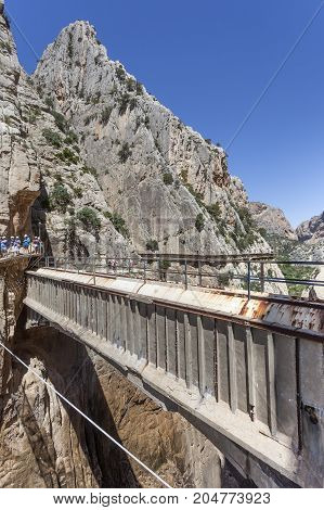 El Chorro Spain - May 31 2017: People at the hiking trail 'El Caminito del Rey' - King's Little Path former world's most dangerous footpath wich was reopened in May 2015. Ardales Malaga province Spain