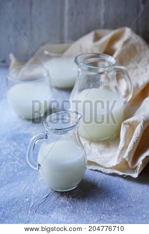 Jugs with serum. Healing product in rustic style