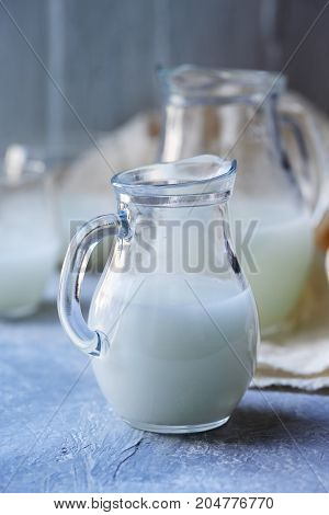 Jugs with serum. Healing product in rustic style