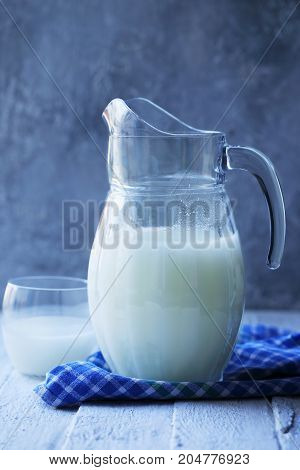 Homemade serum in a Pitcher in rustic style