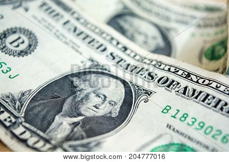 US one dollar bill closeup. Blurred one usd banknote. George Washington portrait. United states money.