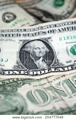 US one dollar bill closeup. Blurred one usd banknote. George Washington portrait. United states money. Business.