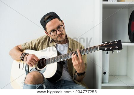 Man Playing Guitar