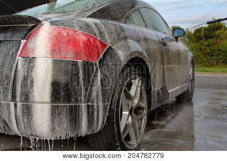 Car detailing : Car Washing with Foam Shampoo.