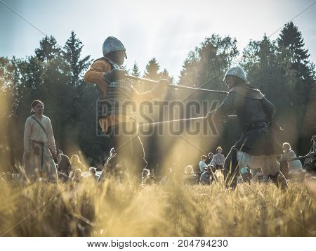Moscow,russia-june 06,2016: Martial Duel Of Two Medieval Spearman Warriors. Opponents With Spear In