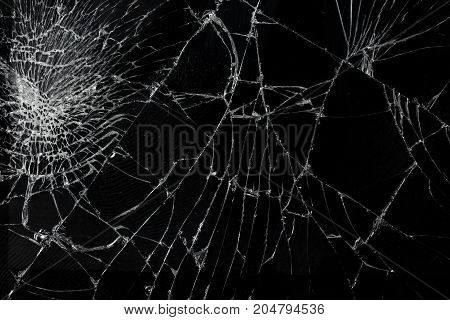 Top view cracked broken mobile screen glass texture background.
