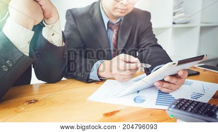 Co-workers are consultants on business documents, tax, transactions and business combinations after a bankrupt merger with a newly founded company.