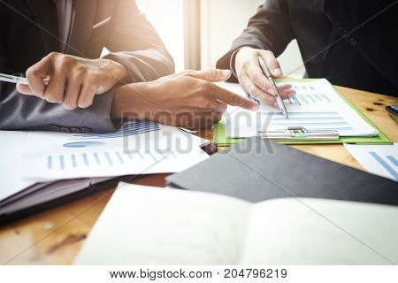 Co-workers are consultants on business documents, tax, transactions and business combinations after a bankrupt merger with a newly founded company.
