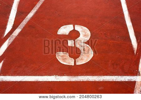 Number three on a athetics track,  Chengdu, China