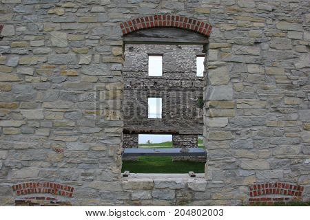 Looking through a window of a ruined building in Fayette Historic State Park, Upper Peninsula of Michigan