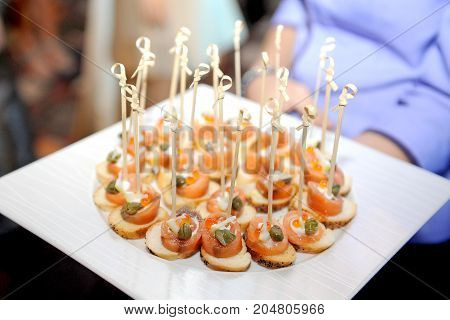 appetizer of salmon and bread for party