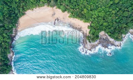 Sea Aerial view Top viewamazing nature background.The color of the water and beautifully bright.Azure beach with rocky mountains and clear water of Thailand ocean at sunny day.flying dronesea view