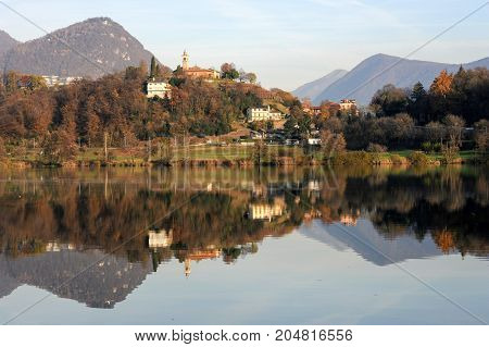 The Church Of Sorengo And Lake Muzzano
