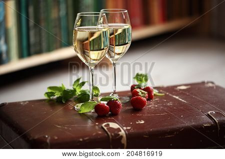 Wineglasses With White Wine Decorated With Strawberry And Mint