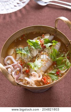 Steam squid with spicy chilli on pan