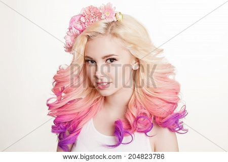 Colored hairs. Portrait of smiling women with curly hairs. Ombre. Gradient. Studio