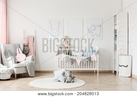 Baby's Room With Grey Armchair