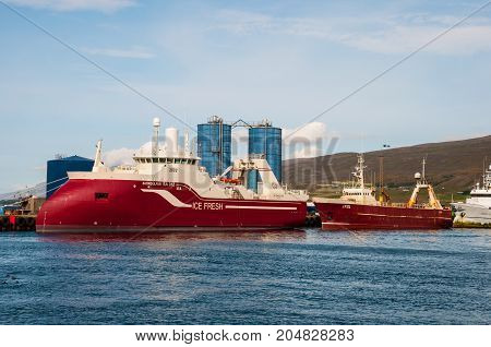 New Built Trawler Bjorgulfur In The Harbor With An Older Trawler