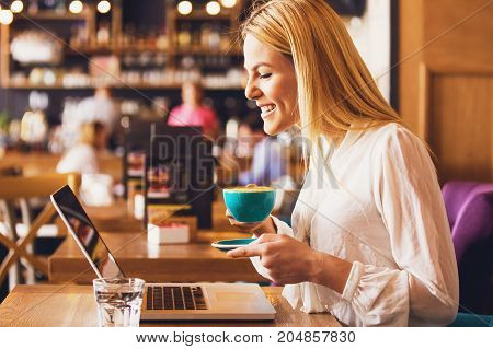 Working And Enjoying Coffee