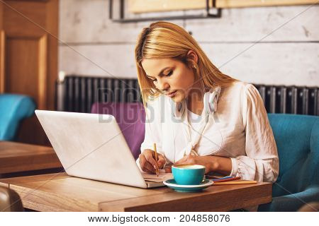 Working And Enjoying Coffee
